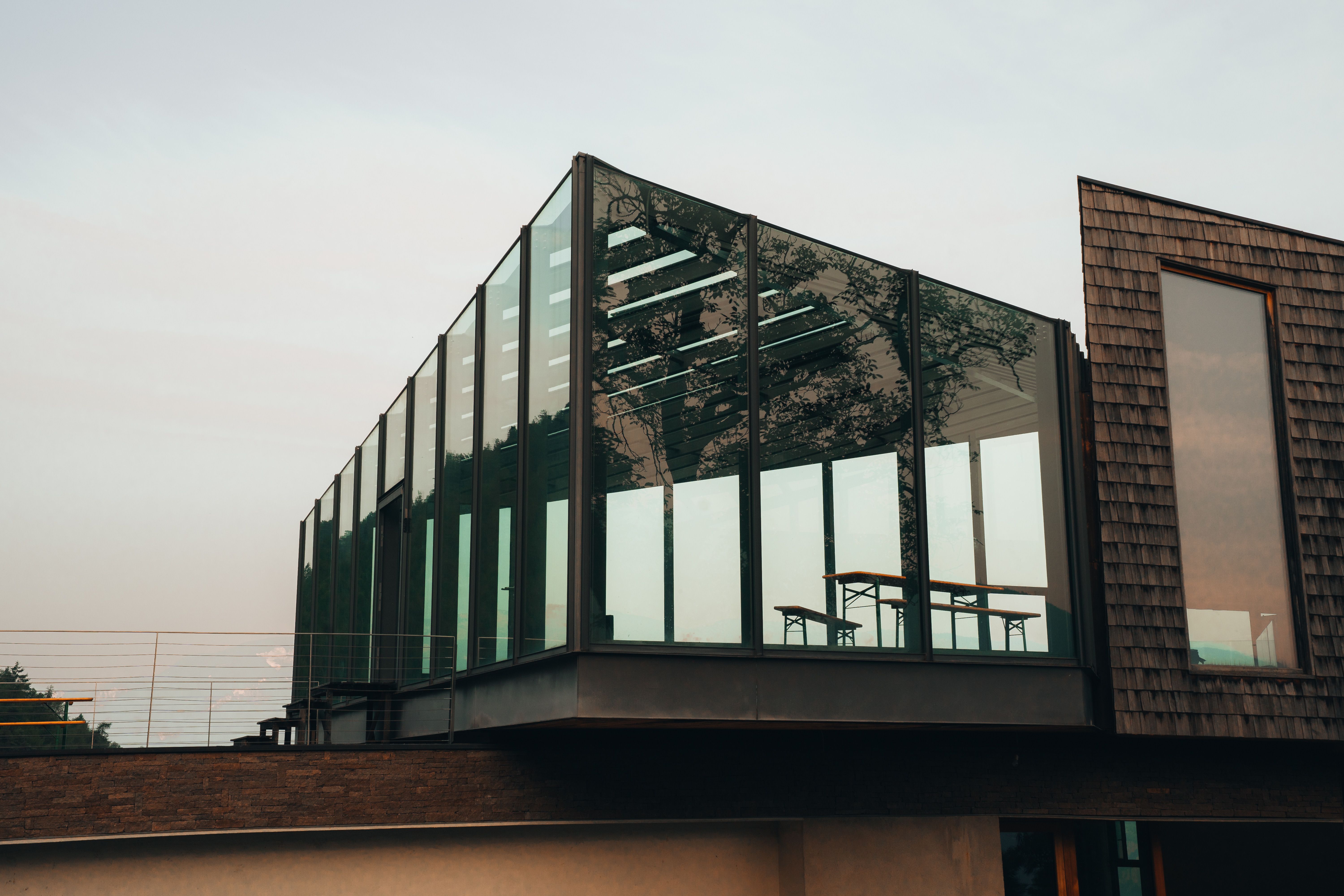 Close-up of the residence's cantilevered concrete balconies and greenery